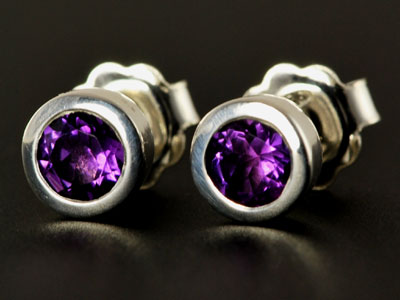 Stunning, handmade gem quality amethyst studs set in pure silver.