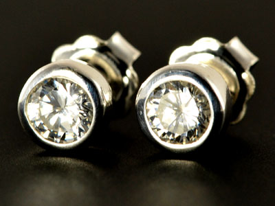 Stunning, handmade cubic zirconia studs set in pure silver.