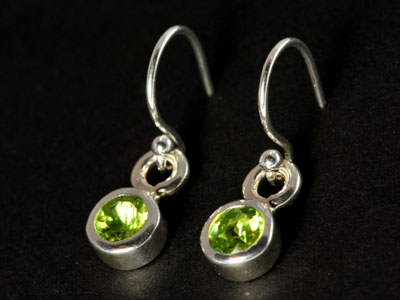 Stunning, handmade gem quality peridot drops set in pure silver.