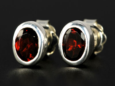 Stunning, handmade gem quality garnet oval studs set in pure silver.