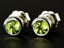 Handmade silver round earrings with peridot gemstone